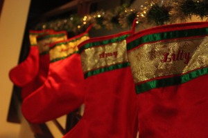 stockvault-red-christmas-stockings-hanging150821